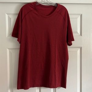Mens short sleeve Lululemon shirt.